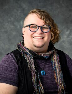 Jay Botsford headshot against gray background