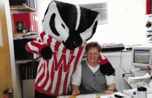 Lynn Sullivan in the 1990s pictured with Bucky Badger