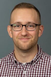 David Sparkman headshot in front of gray background